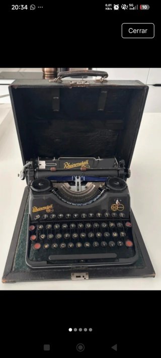 Máquina de escribir Rheinmetall antigua año 30 lee