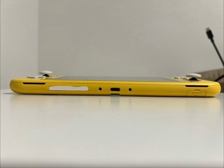 Nintendo Switch Lite + Cargador + Funda