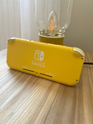 Nintendo Switch Lite + Cargador + Funda