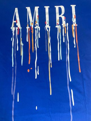 Camiseta AMIRI azul con logo