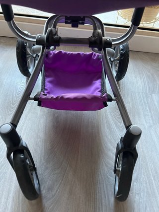Carro de juguete tipo Bugaboo morado