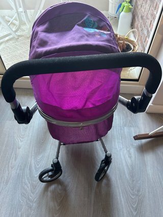 Carro de juguete tipo Bugaboo morado