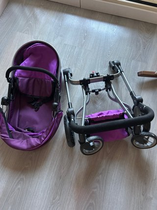 Carro de juguete tipo Bugaboo morado