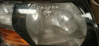 Faróis Pajero 2005