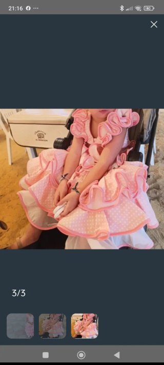 Traje de flamenca rosa volantes