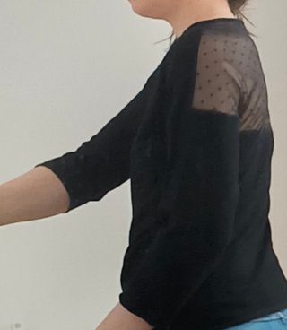 Cardigan nero con zip, taglia S.