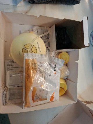 Sacaleches Medela Swing con accesorios