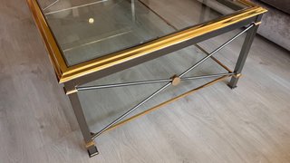 Mesa de centro cristal y metal dorado