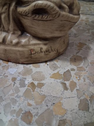 Escultura de hombre con cesta  Escultor Bolinches
