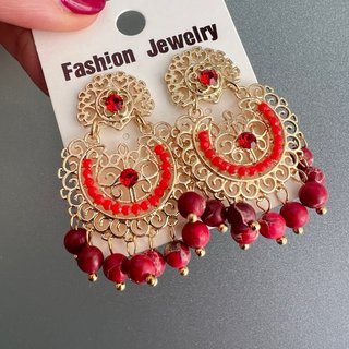 Pendientes de flamenca dorados con detalles rojos