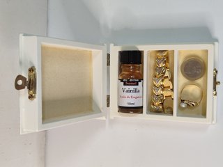 1 estuche de madera + 3 aceites de fragancias
