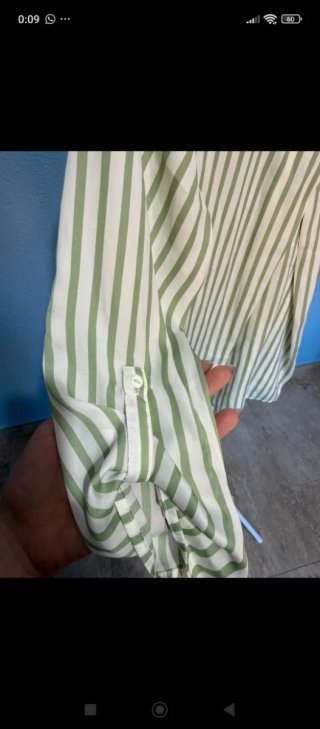 Blusa de rayas verde y blanco
