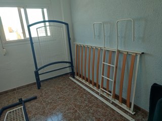 Litera de madera y metal