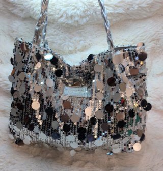 Borsa paillettes effetto metallico