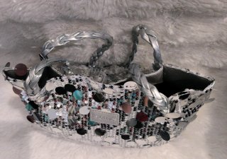 Borsa paillettes effetto metallico