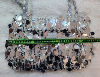 Borsa paillettes effetto metallico