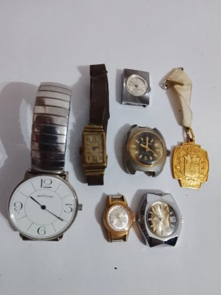 Lote de relojes y medalla