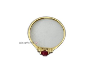 anillo oro 18k con piedra con rubi