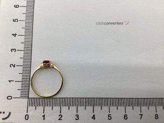 anillo oro 18k con piedra con rubi