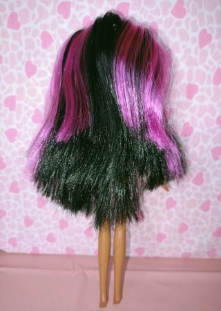 Muñeca clon con camiseta original