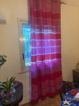 Tende a pacchetto rosa e rosse