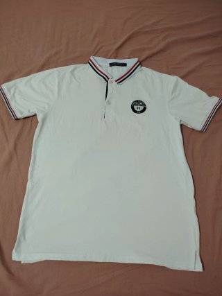 Polo Tommy Hilfiger Talla L Blanco