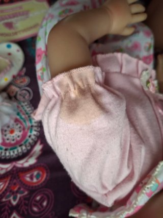 Bambola reborn vestita rosa