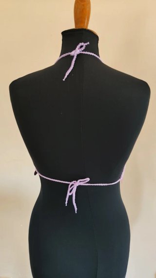 Top maglia con paillettes e lacci