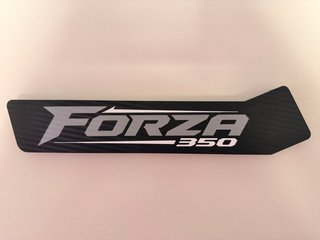 Tapa hueco herramientas Honda Forza 350