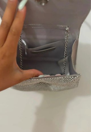 Bolso de mano Zara plateado con lazo