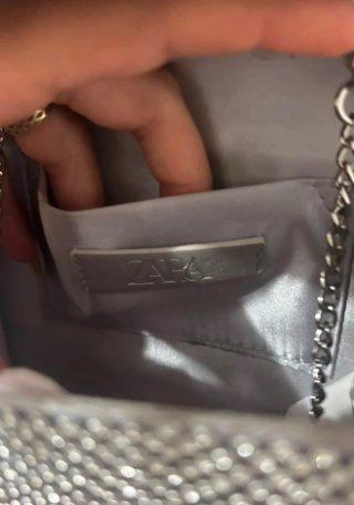 Bolso de mano Zara plateado con lazo