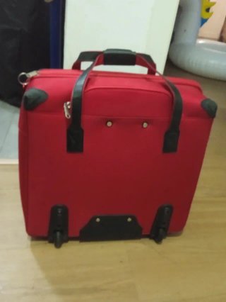 Maleta de viaje roja