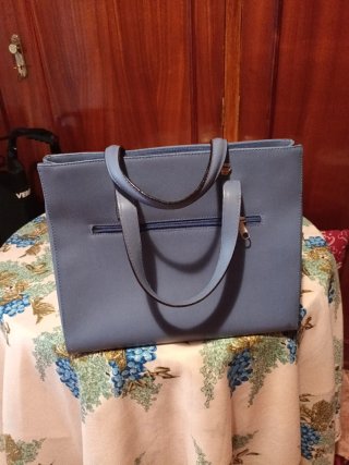 Bolso Hexagona Azul piel.