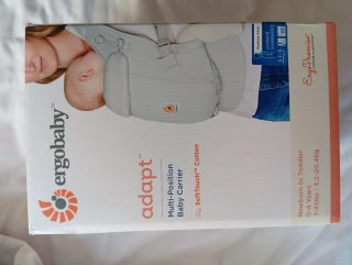Mochila Ergobaby + Protector Lluvia