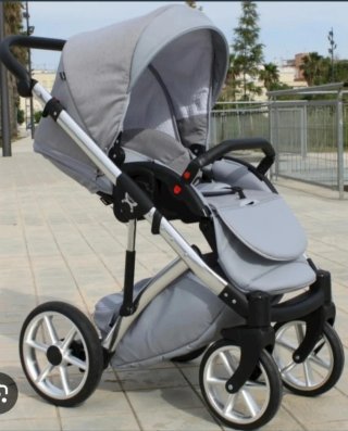 Carro de bebé y sillita gris