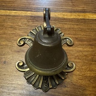Campanilla llamador de puerta antigua