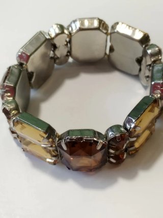 Pulsera elástica pedrería marrón