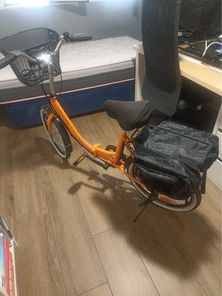 Bicicleta Eléctrica Naranja con Cesta
