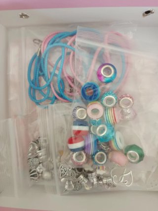 Caja de juegos educativos y libro infantil