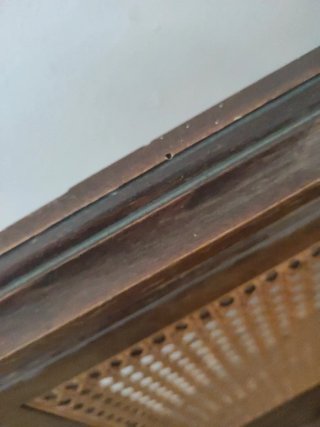Cama antigua de madera y ratán per restaurar