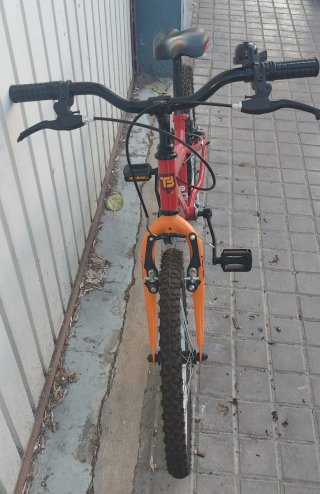 Bicicleta infantil de cross naranja y roja Topbike