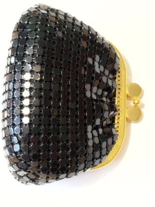 Monedero vintage negro y dorado