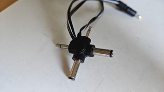 Cargador universal regulable
