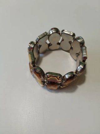 Pulsera elástica pedrería tonos topacio y ámbar