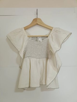 Blusa niña blanca con volantes