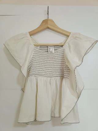 Blusa niña blanca con volantes