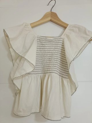 Blusa niña blanca con volantes