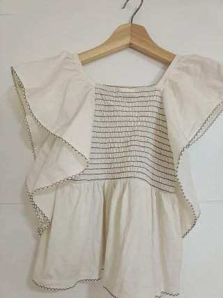 Blusa niña blanca con volantes