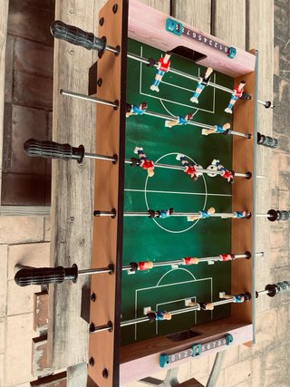 Futbolín de mesa en su caja original