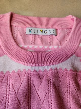 Jersey Kling rosa y blanco lazos